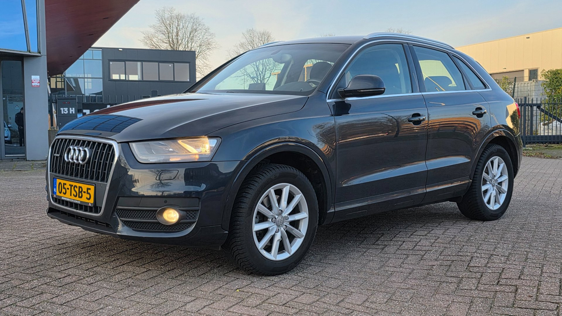 Audi Q3 2.0 TFSI quattro Pro Line 4x4*211pk!*Nieuwstaat!*LAGE KM NAP*AUT*PDC V+A*CLIMA*CRUISE*NAVI*STOELVERW.*Etc. 2012 - voorkant
