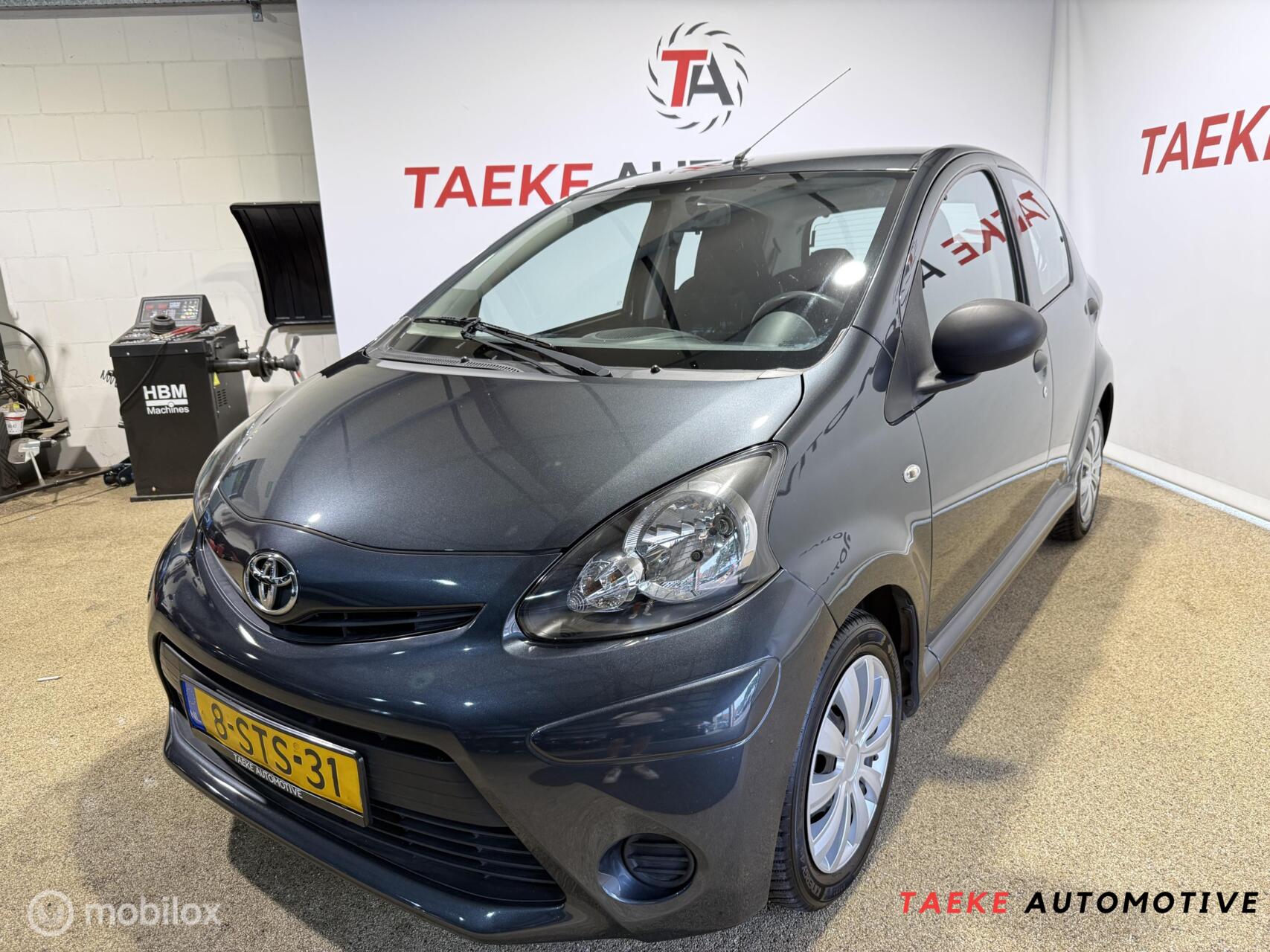 Toyota Toyota Aygo 1.0 VVT-i Now AIRCO/5DRD/1EIG/APK/NAP/BEURTJE 2014 - voorkant
