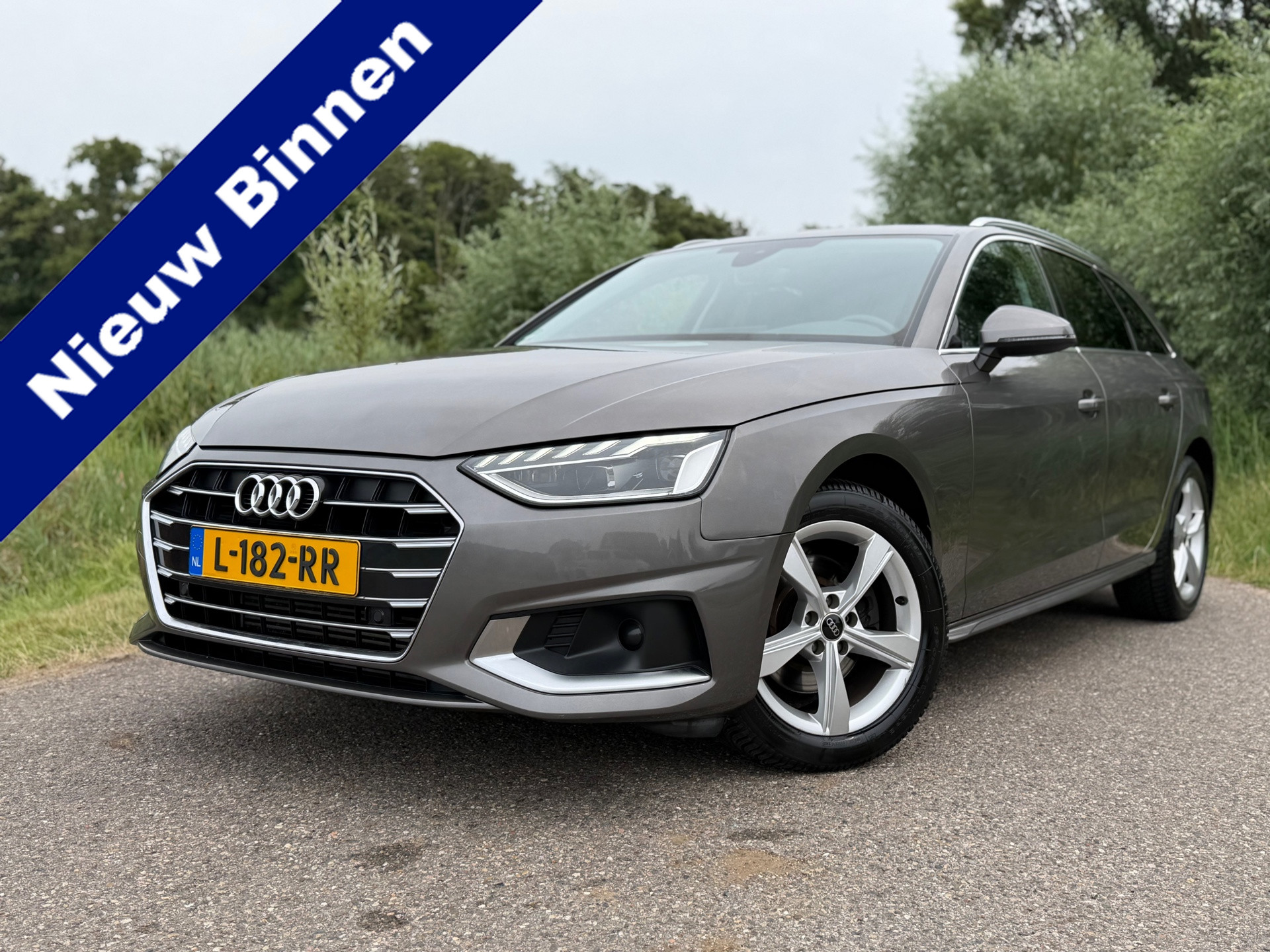 Audi A4 Avant 35 TFSI Business Edition / Automaat / NL Auto / 1 Eigenaar / Airco / Navi / Stoelverwarming / Electrische Achterklep 2021 - voorkant