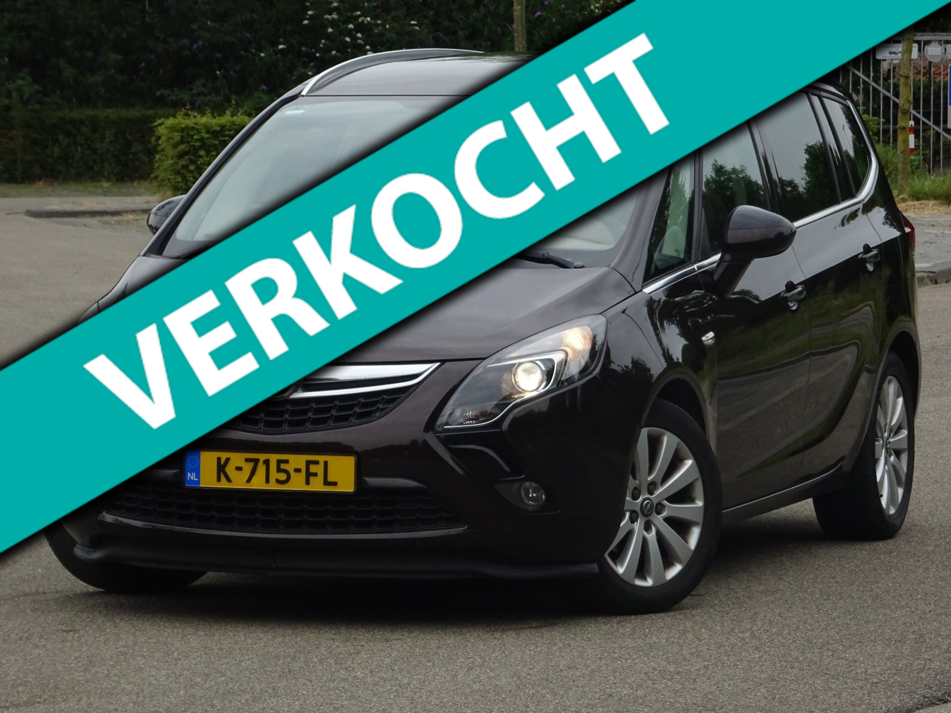 Opel Zafira Tourer 1.4 Cosmo AIRCO/NAVIGATIE/CRUISE/PDC/APK 2012 - voorkant