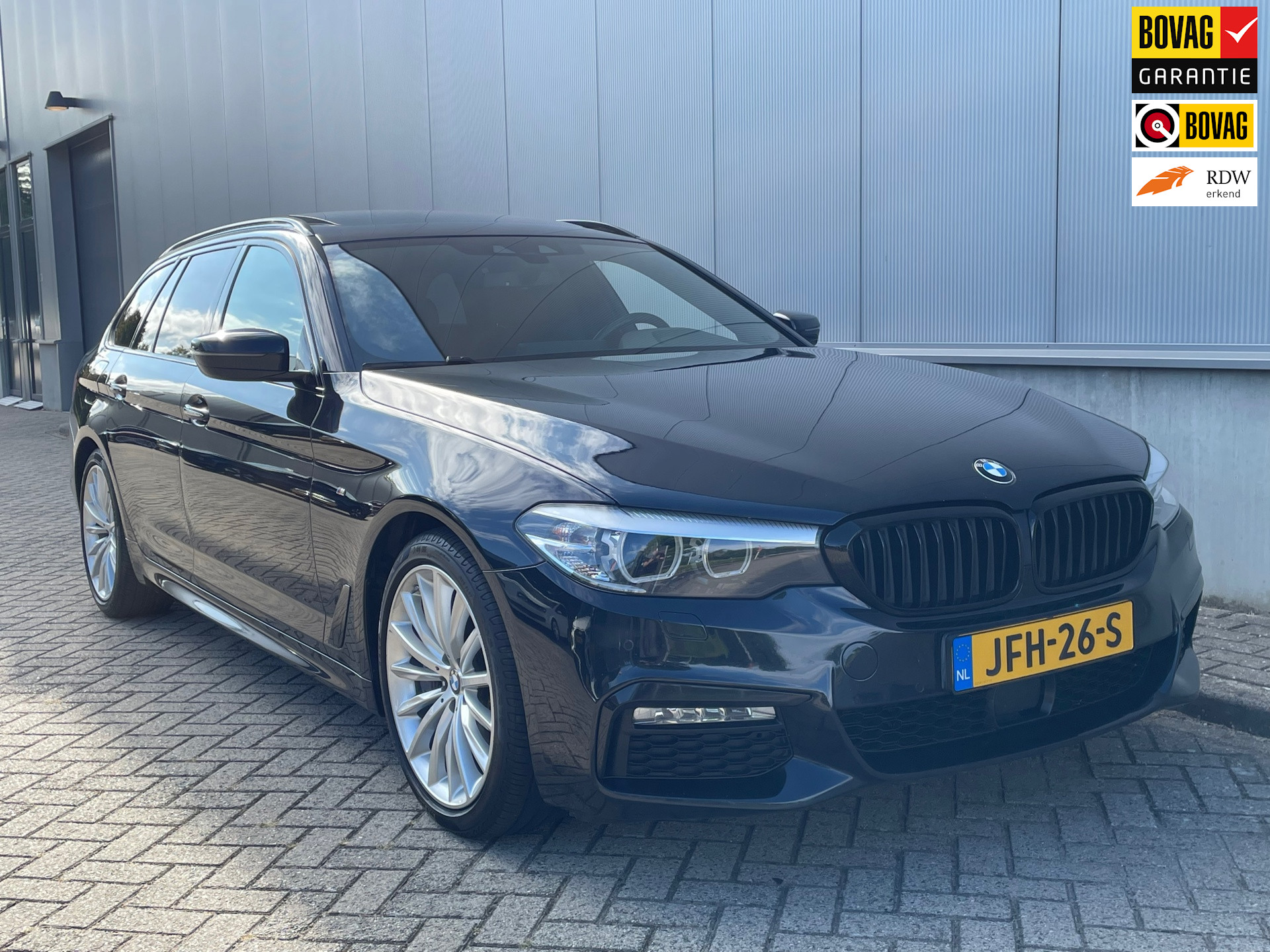 BMW 5-serie Touring 540i xDrive High Executive PanoramaDak / M-Sport 2018 - voorkant