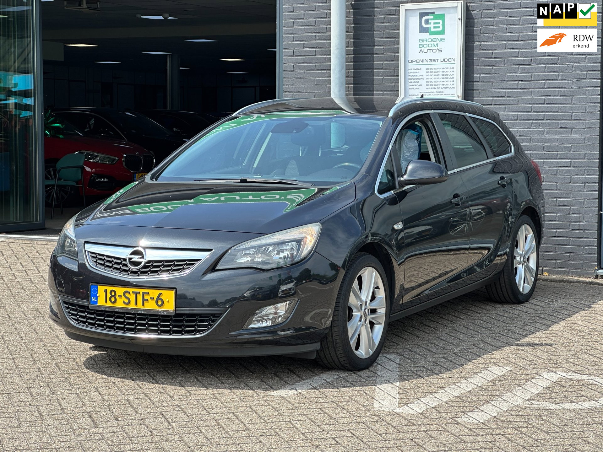 Opel Astra Sports Tourer 1.4 Turbo Sport/NAVI/AIRCO/140 PK/DIS RIEM IS VERVANGEN!! 2011 - voorkant