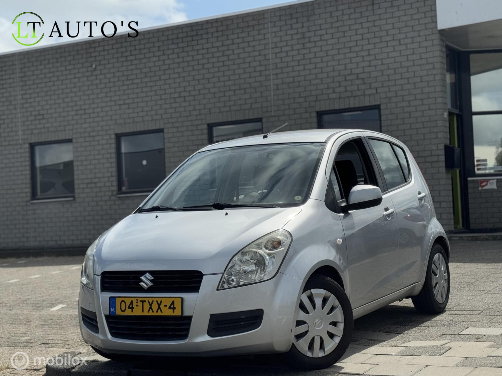 Suzuki Splash 1.0 VVT Comfort|Airco APK NAP 2012 - voorkant
