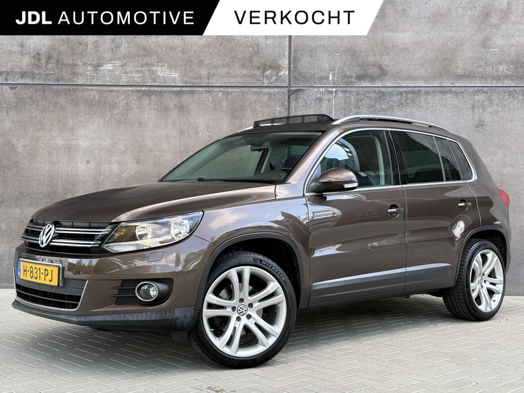 Volkswagen Tiguan 1.4 TSI 160PK|PANO|GEREVISEERDE MOTOR|NAVI|CRUISE|CLIMA|STOELVERWARMING|RNS315|19"|TREKHAAK 2012 - voorkant