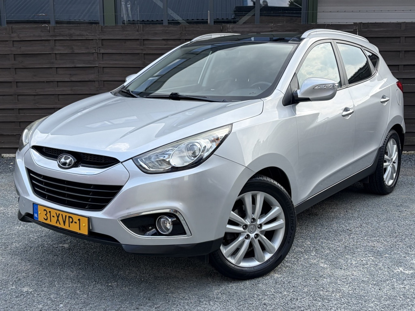 Hyundai Ix35 2.0i i-Catcher AUT / Pano / Navi / Trekhaak / NAP 2012 - voorkant
