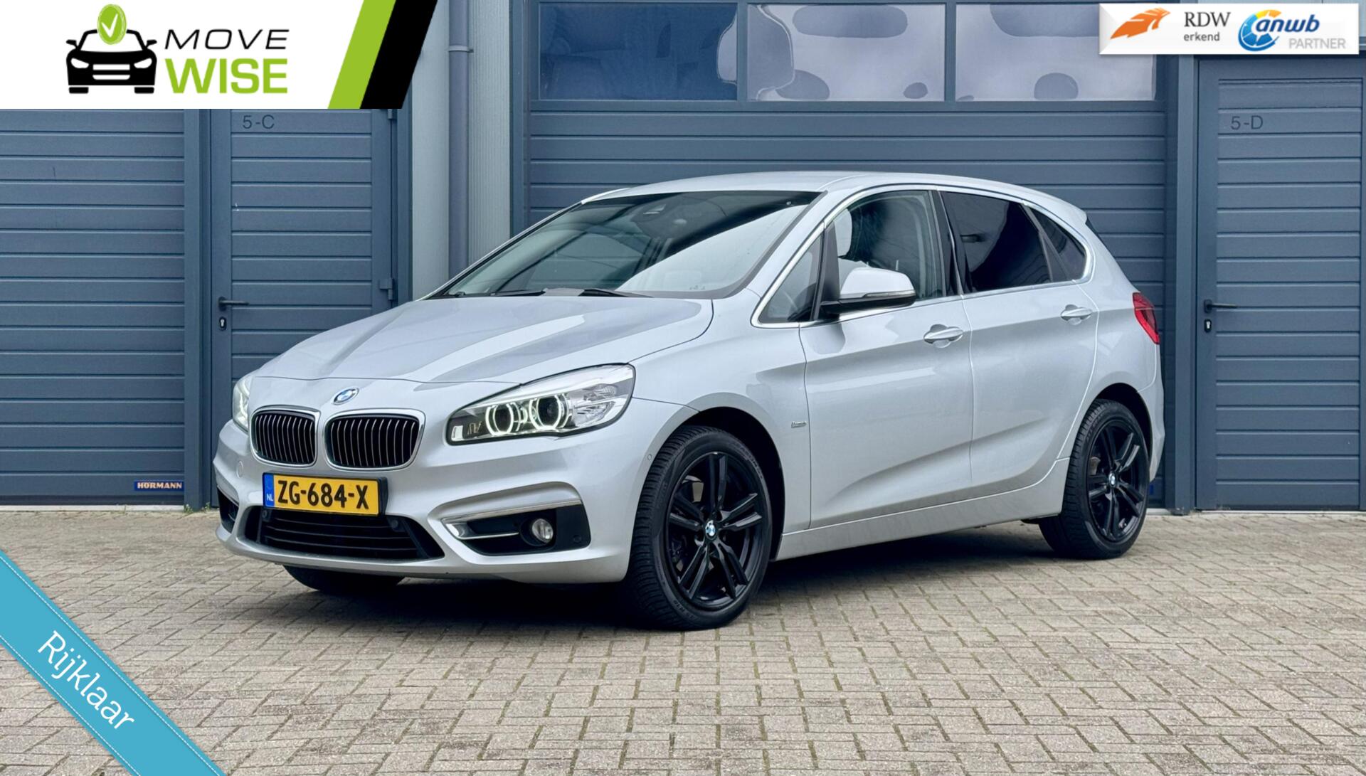 BMW 220i Active Tourer 220i 192pk Luxury  | AUTOMAAT | Compleet ! | 133.000 KM | Hoge Zit | Camera | 2015 - voorkant