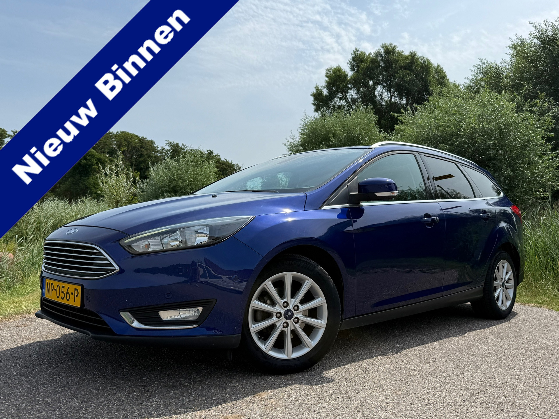 Ford Focus 1.0 Titanium | 1e Eigenaar | Apple CarPlay/Android Auto | Trekhaak | Navi | Clima | 16" Velgen | PDC | Cruise | 2017 - voorkant