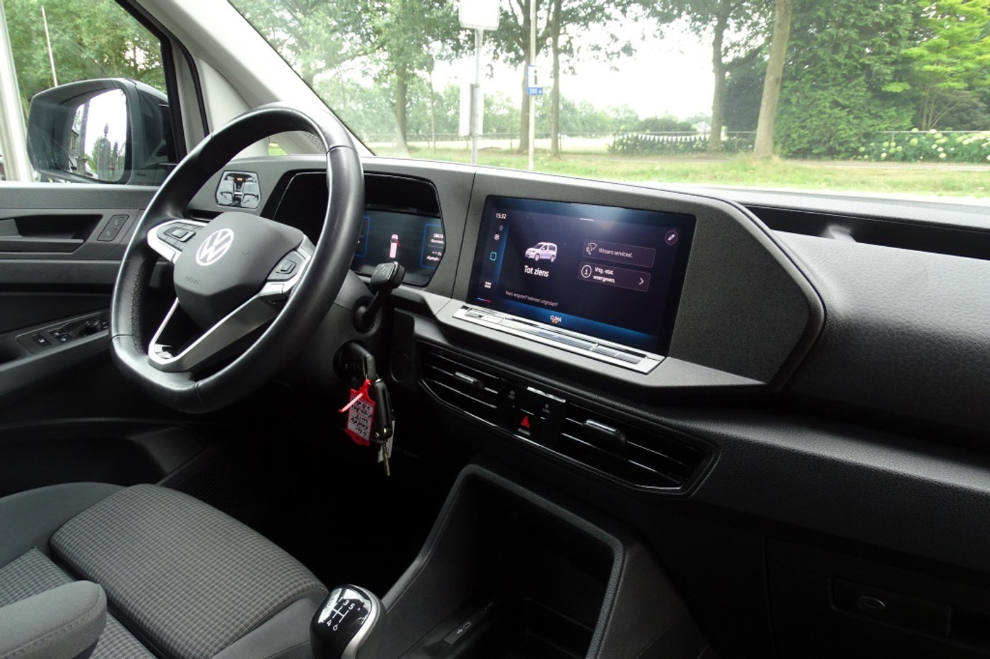 Foto van Volkswagen Caddy Modified Partition Wall