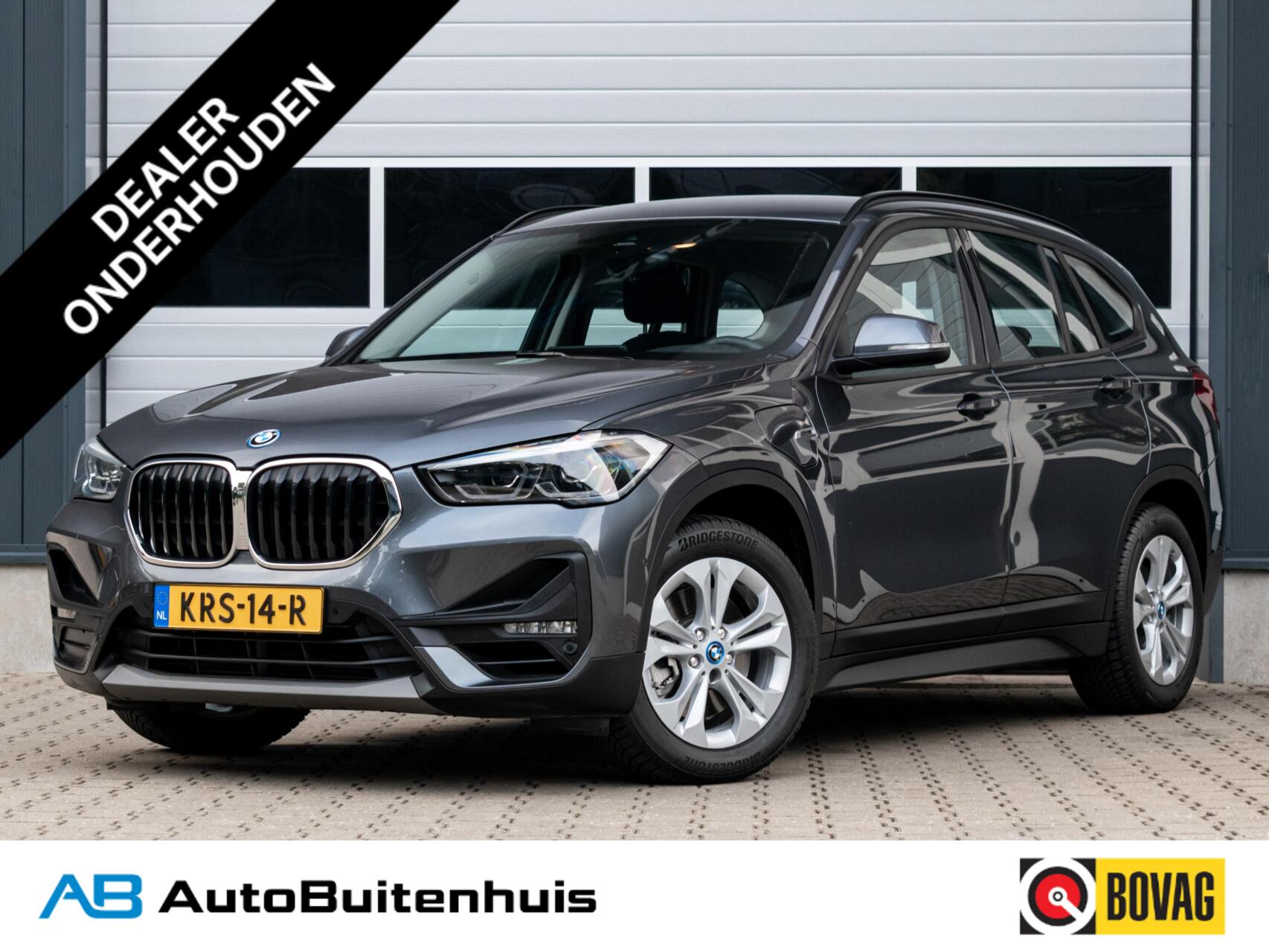 BMW X1 xDrive25e High Executive|1e EIGENAAR|ELEK.KLEP|TREKHAAK|HEAD-UP 2022 - voorkant
