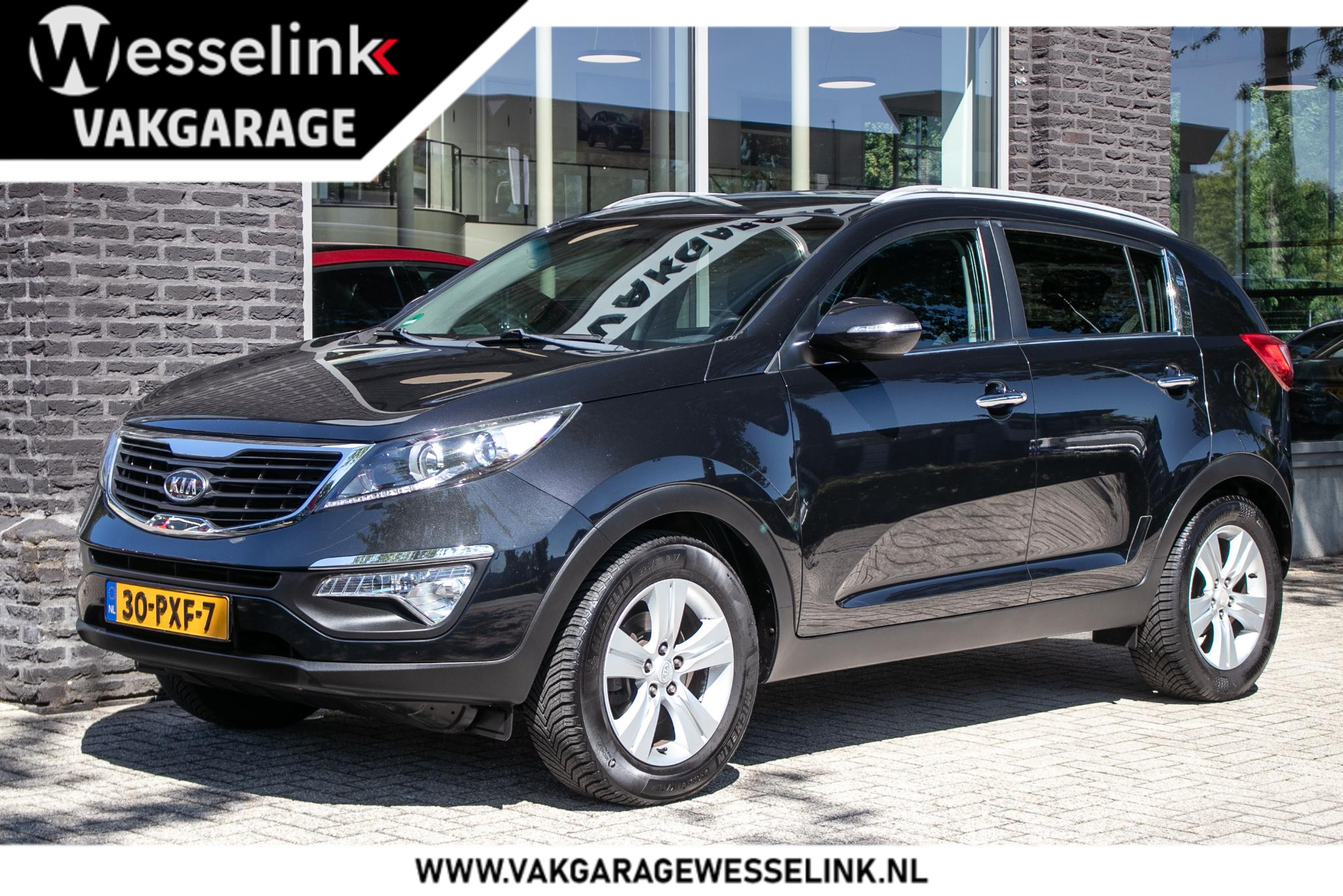 Kia Sportage 1.6 GDI X-ecutive Plus Pack 2011 - voorkant