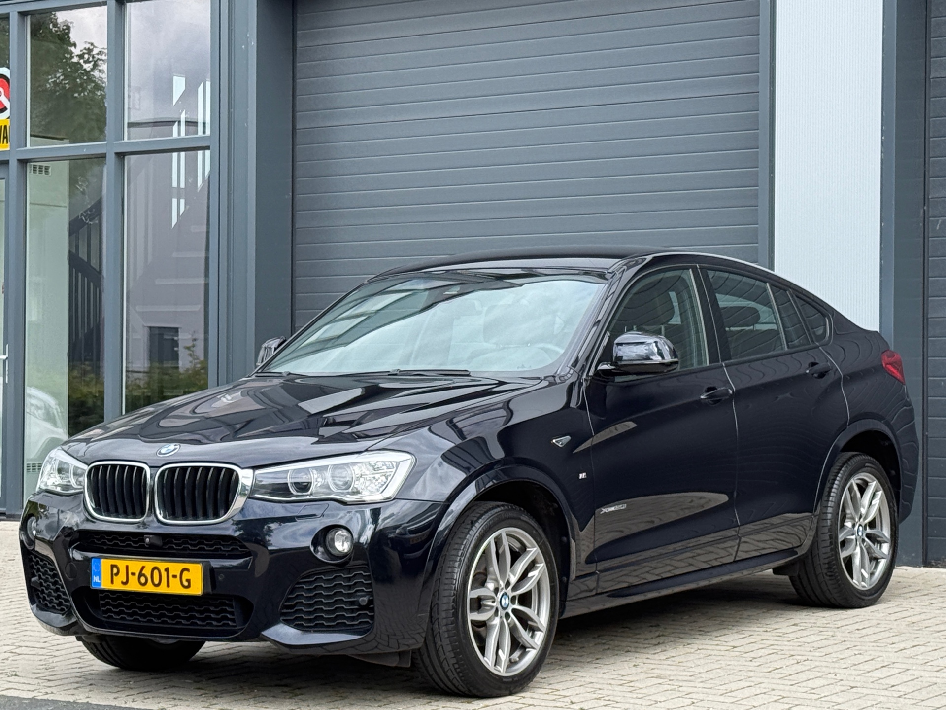 Foto van BMW X4 Xdrive20i
