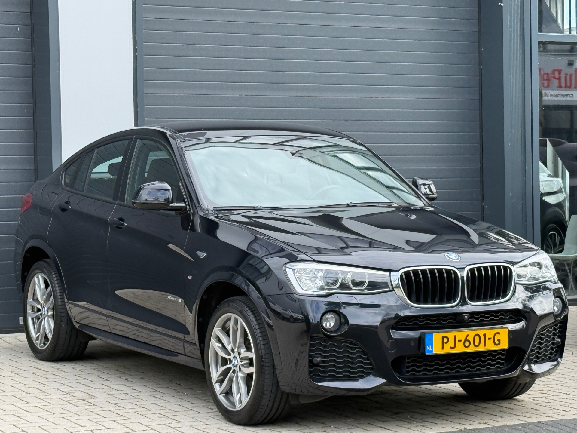 Foto van BMW X4 Xdrive20i