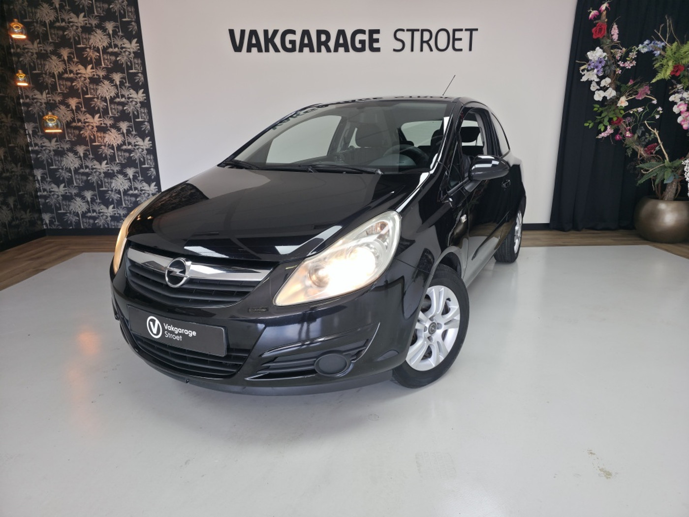 Opel Corsa 1.2-16V Airco | lichtmetaal | originele oh.boekje | jaarbeurt 2007 - voorkant