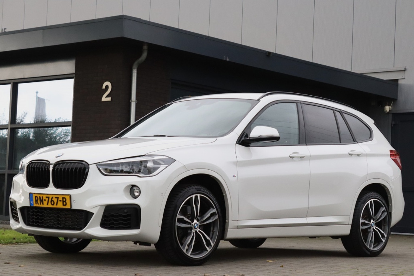 BMW X1 Sdrive20i sDrive20i M Sport 192PK Leder Trekhaak 19inch 2018 - voorkant
