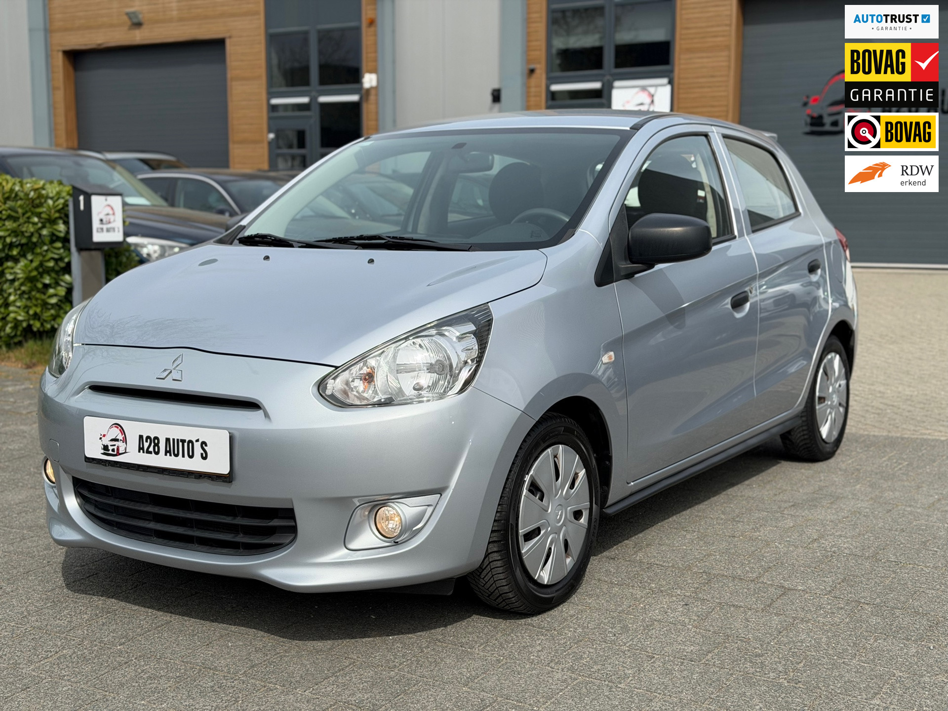 Mitsubishi Mitsubishi Space Star 1.0 Entry | Lage kosten |Airco | Nieuwe APK 2014 - voorkant