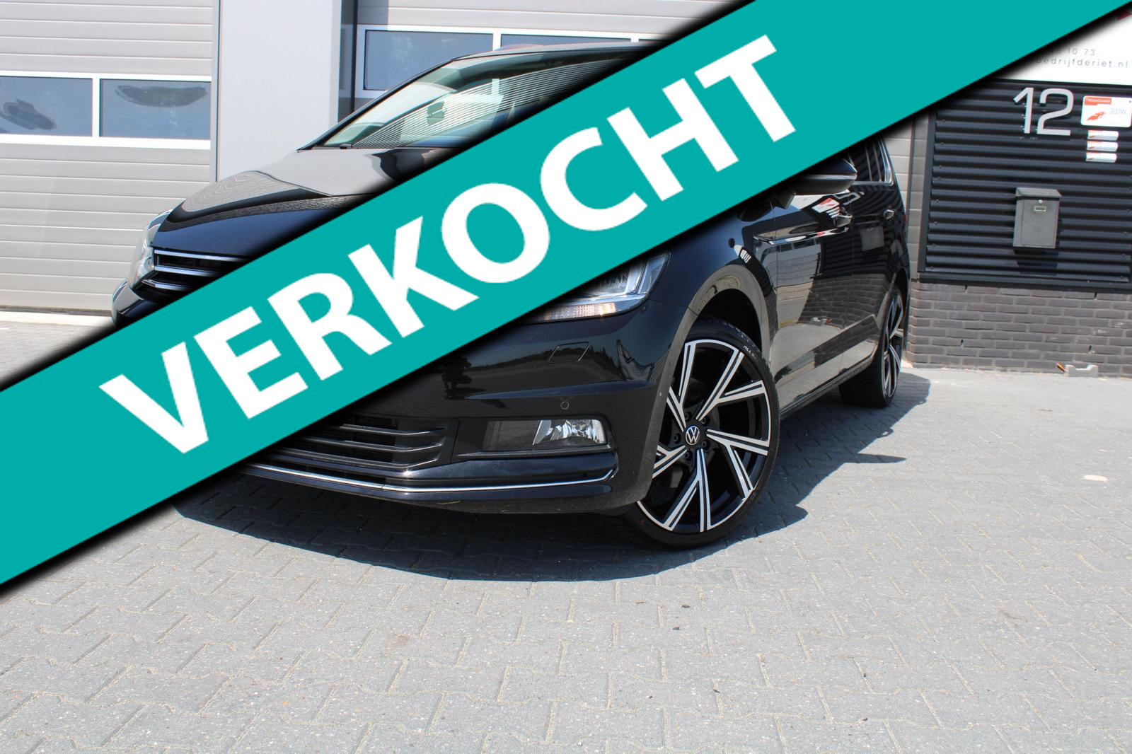 Volkswagen Touran 1.5 TSI DSG Highline |PANO|CAMERA|PDC V+A|NAVI|ALCANTARA | VOLL 2022 - voorkant