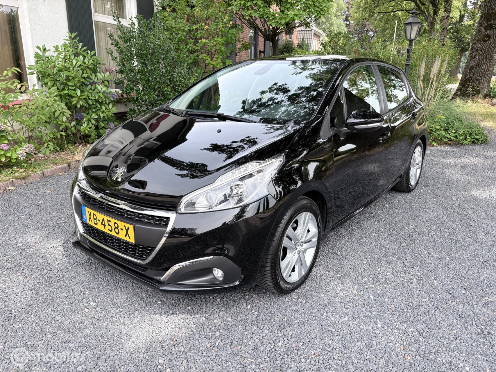 Peugeot 208 1.2i Signature (Airco, Cruise-control, 5 drs) 66.000 Km 2018 - voorkant