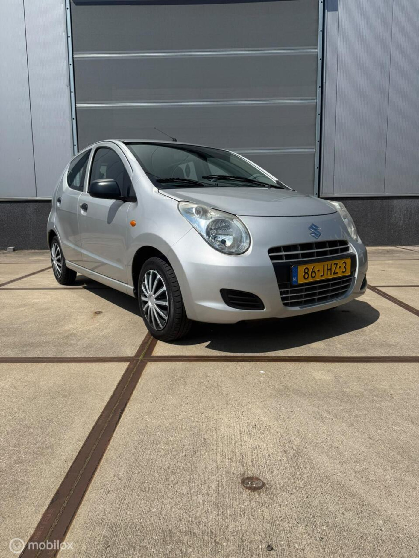 Suzuki Alto 1.0 lage Km Airco 5drs Nieuwe APK! 2009 - voorkant