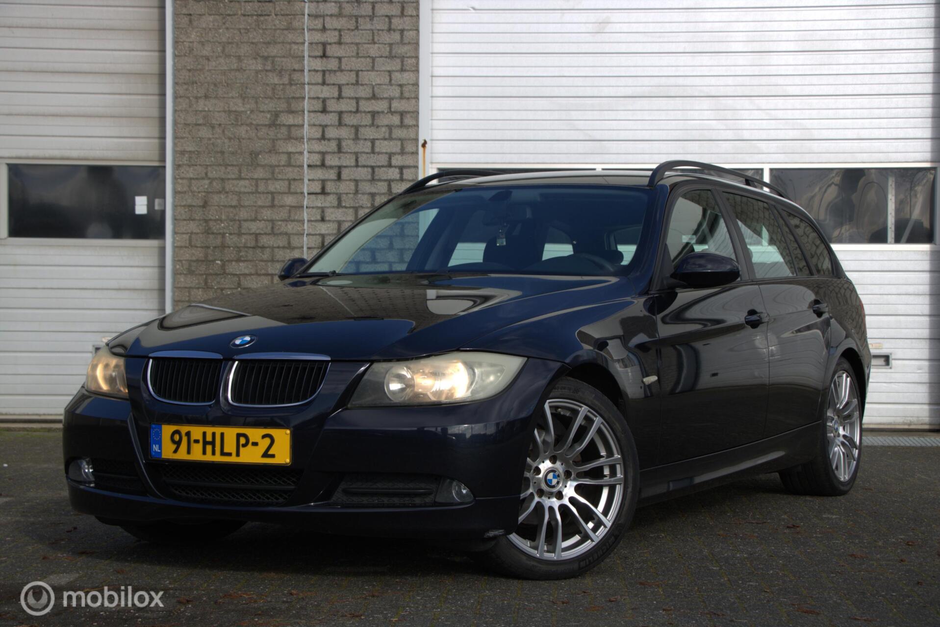 BMW 3er Reihe 318i Business Line 2009 - voorkant