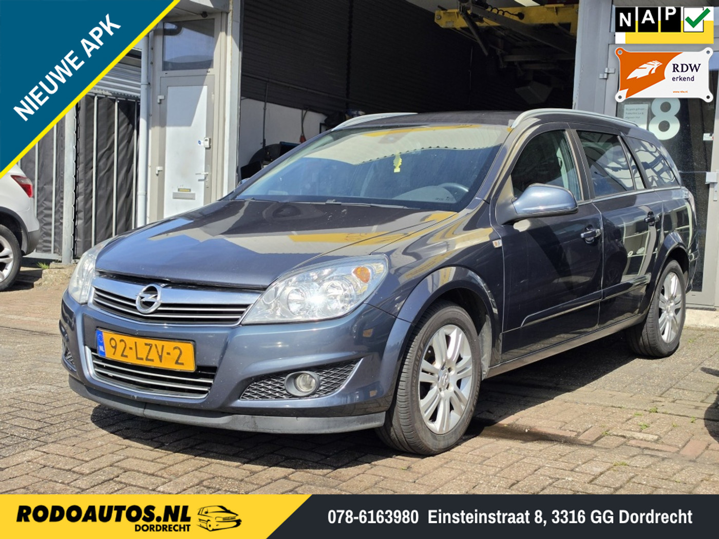 Opel Astra Station Wagon 1.6 Cosmo Airco/Cruise APK 05-2027 ✅ 2010 - voorkant
