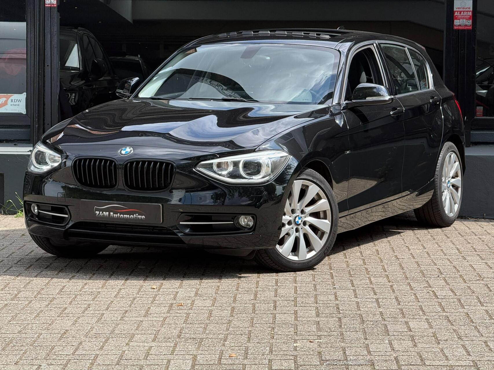 BMW 118i 118i High Executive M-Sport Aut*Xenon*Schuifdak* 2013 - voorkant