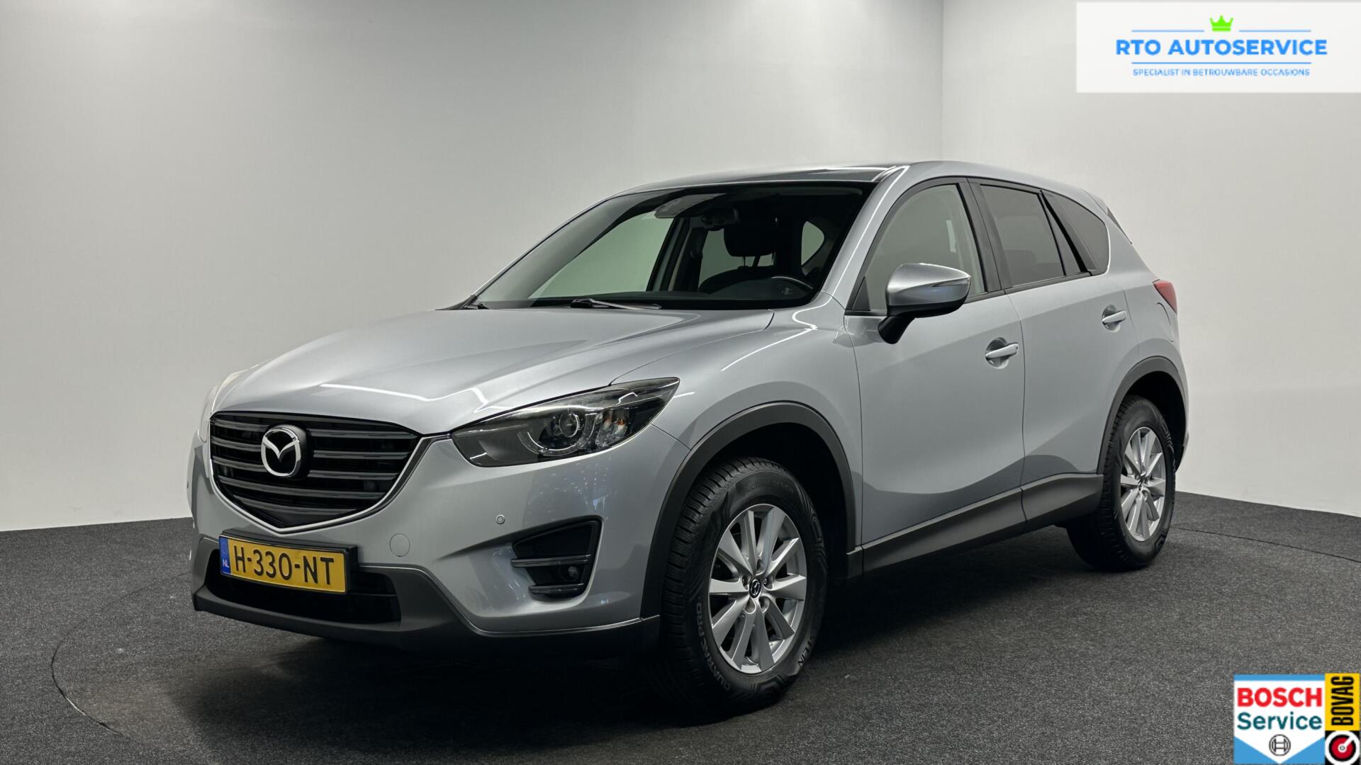 Mazda Mazda Cx-5 2.0 SkyActiv-G 165 Skylease+ 2WD NAVI CARPLAY TREKHAAK ECC CRUISE. 2015 - voorkant