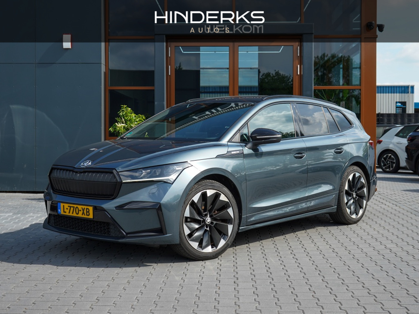 Skoda Enyaq 60 60 Sportline | 91,98 % SOH | Trekhaak | Camera | Adap. Cruise | 2021 - voorkant