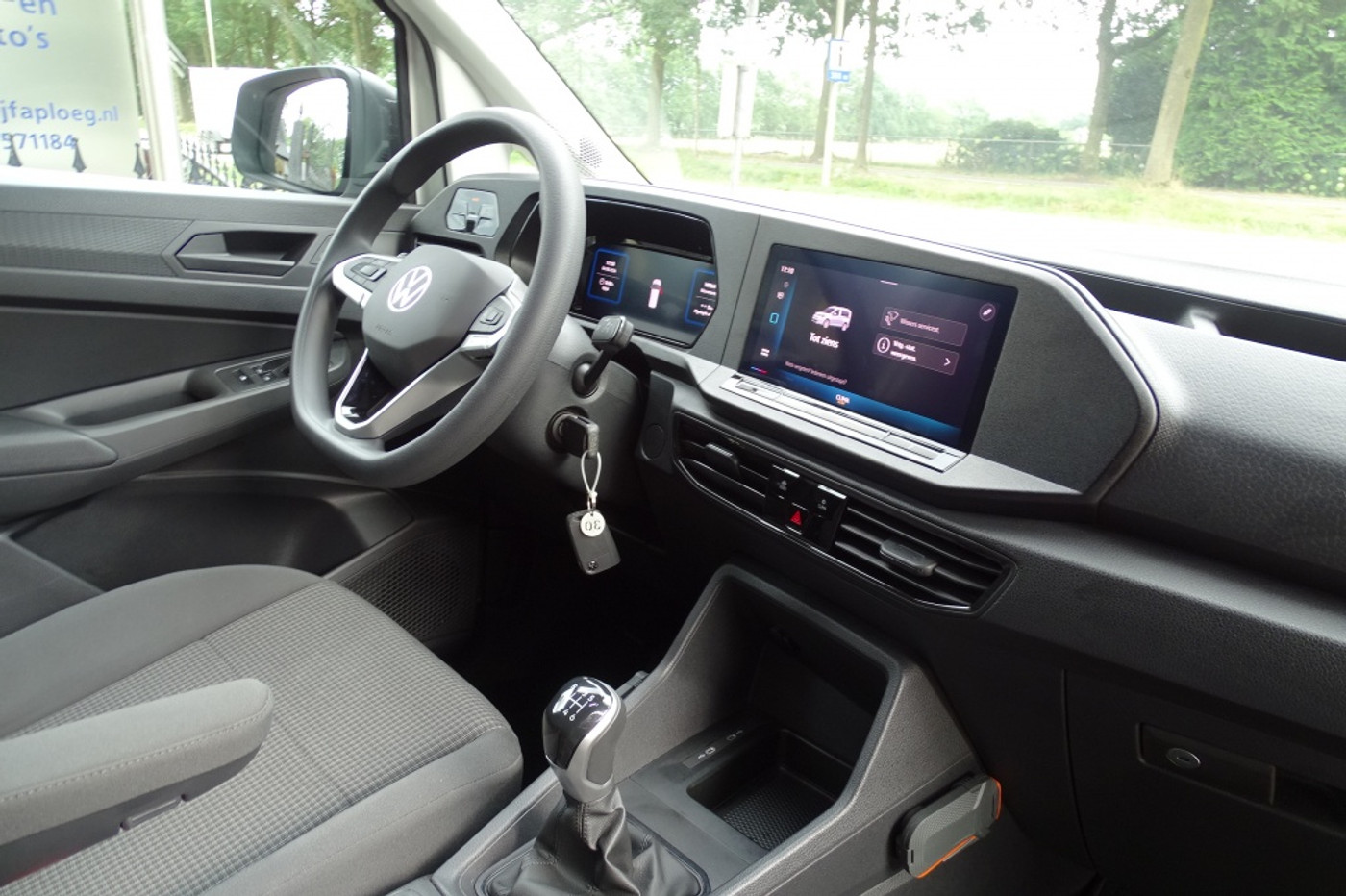 Foto van Volkswagen Caddy Modified Partition Wall