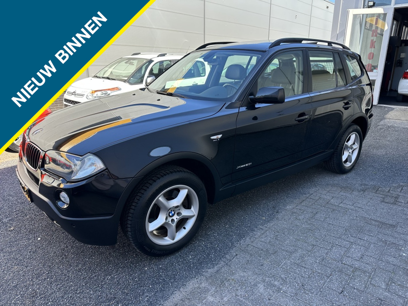 BMW X Reihe 2.0i High Executive 2009 - voorkant