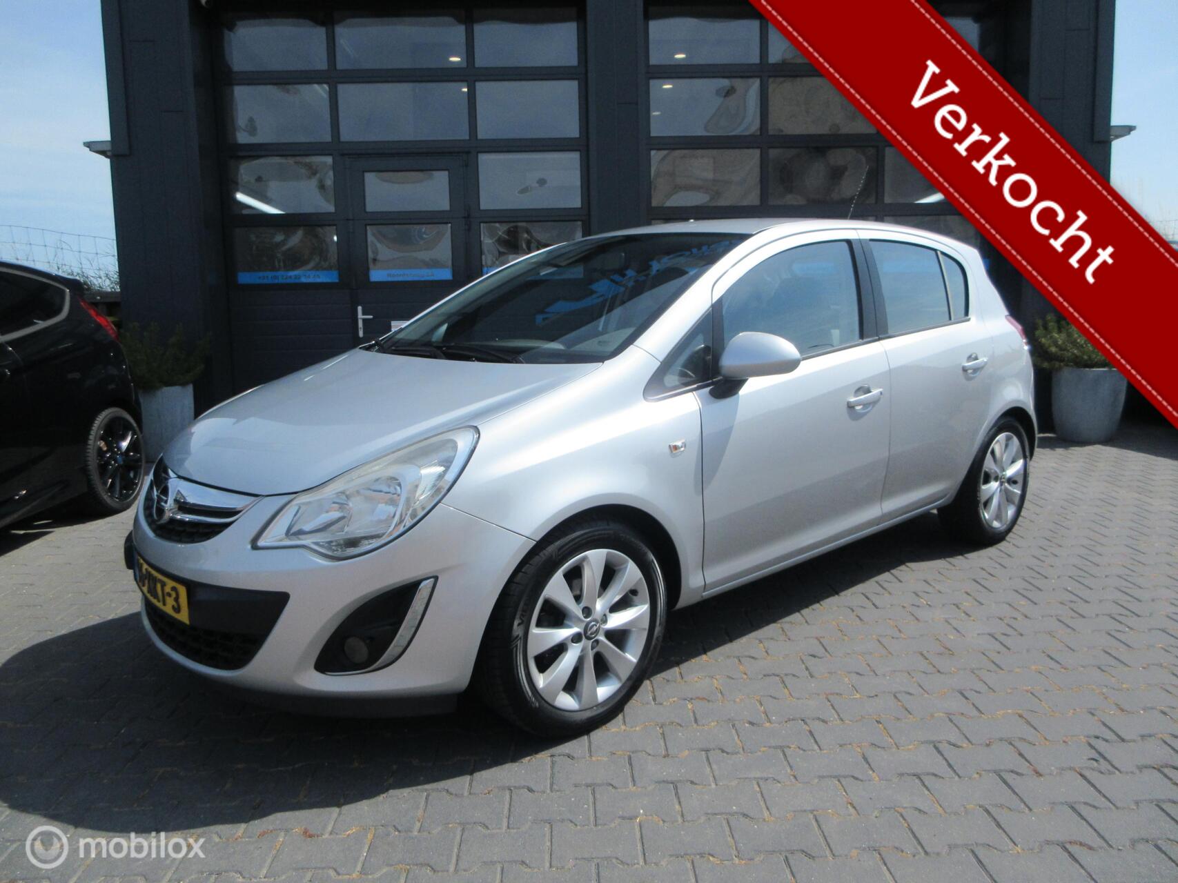 Opel Corsa 1.2-16V Anniversary Edition 5drs Airco Cruise NL auto 2012 - voorkant