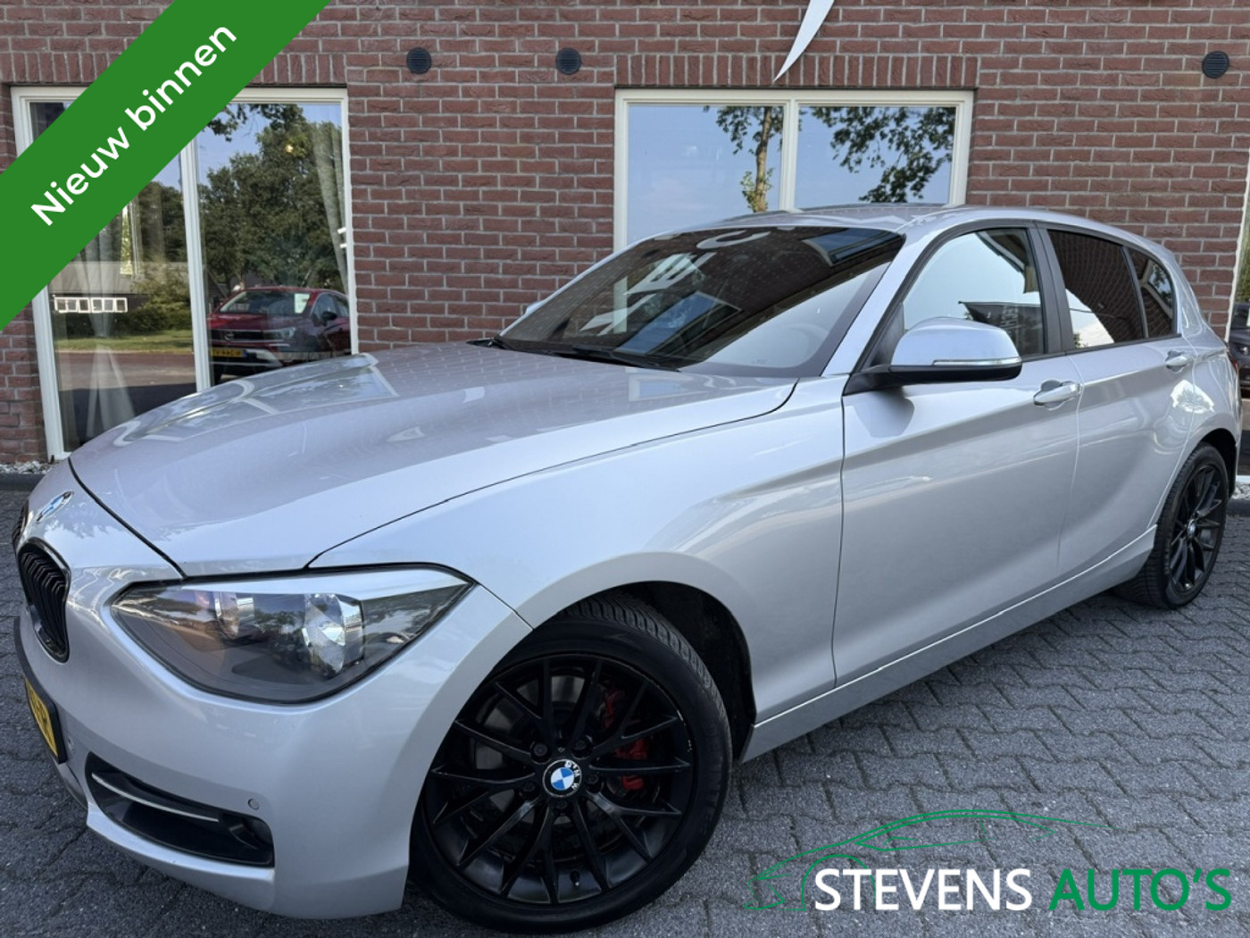 BMW 118i 118i 170PK SPORTSTOELEN / NAVI / CLIMA / CRUISE / PDC 2012 - voorkant