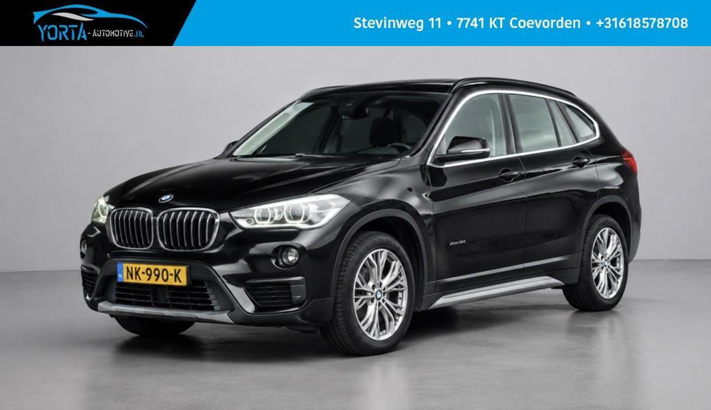 BMW X1 sDrive20i High Executive NL AUTO*PANO*ACC*AFN. HAAK 2017 - voorkant