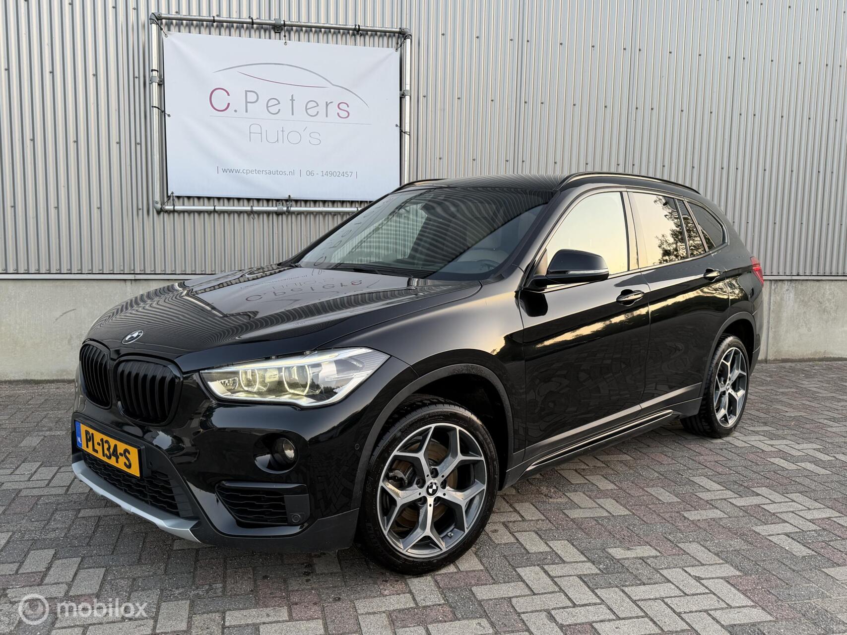 BMW X1 Sdrive20i sDrive20i 192pk Aut. High Executive 2017 / Head-Up / Leer / LED koplampen / Navi Pro / Trekhaak / NAP 2017 - voorkant