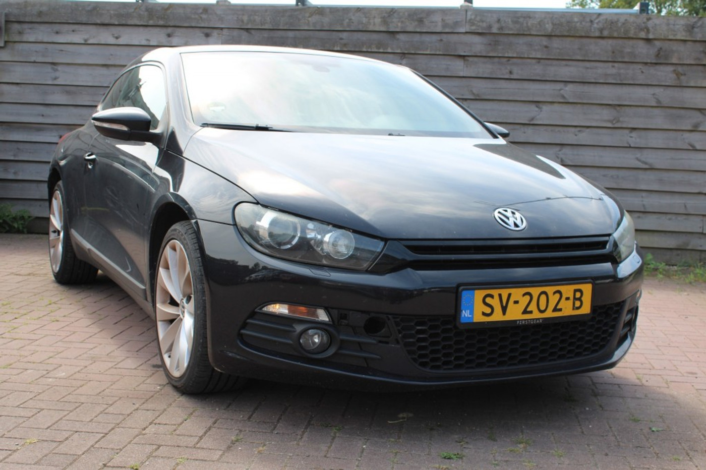 Volkswagen Scirocco 1.4 TSI 160pk Highline automaat ECC/carplay/cruise opknapper 2009 - voorkant