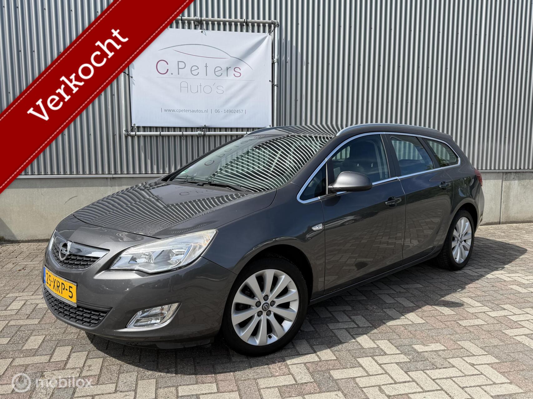 Opel Astra Sports Tourer 1.4 Turbo Business + 2012 / Climate / Trekhaak / Cruisecontrol / NAP 2012 - voorkant