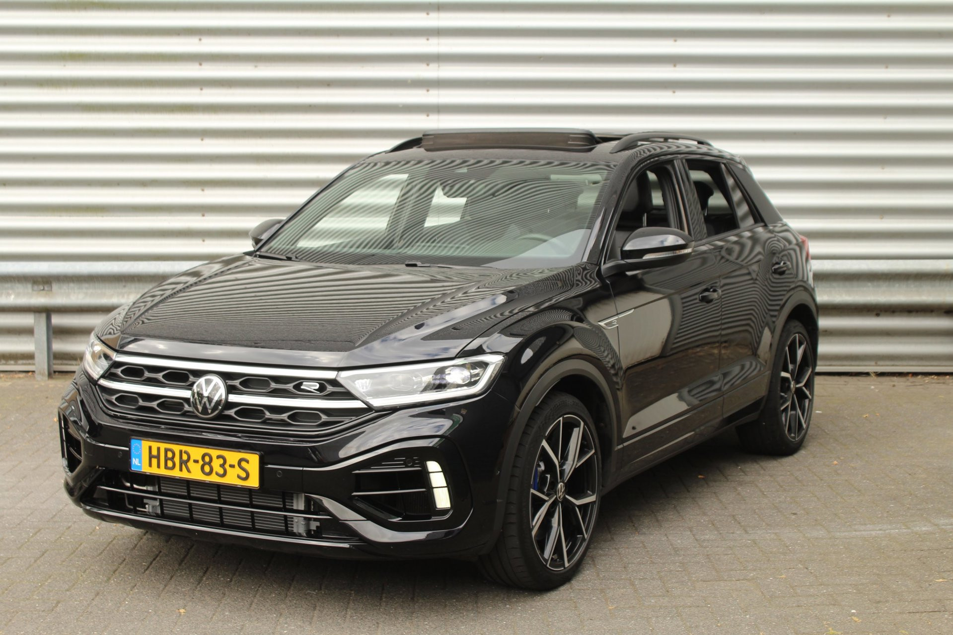 Volkswagen T-roc 2.0 TSI 300pk 4Motion R DSG7 Panoramadak Clima LMV Sfeer 2024 - voorkant