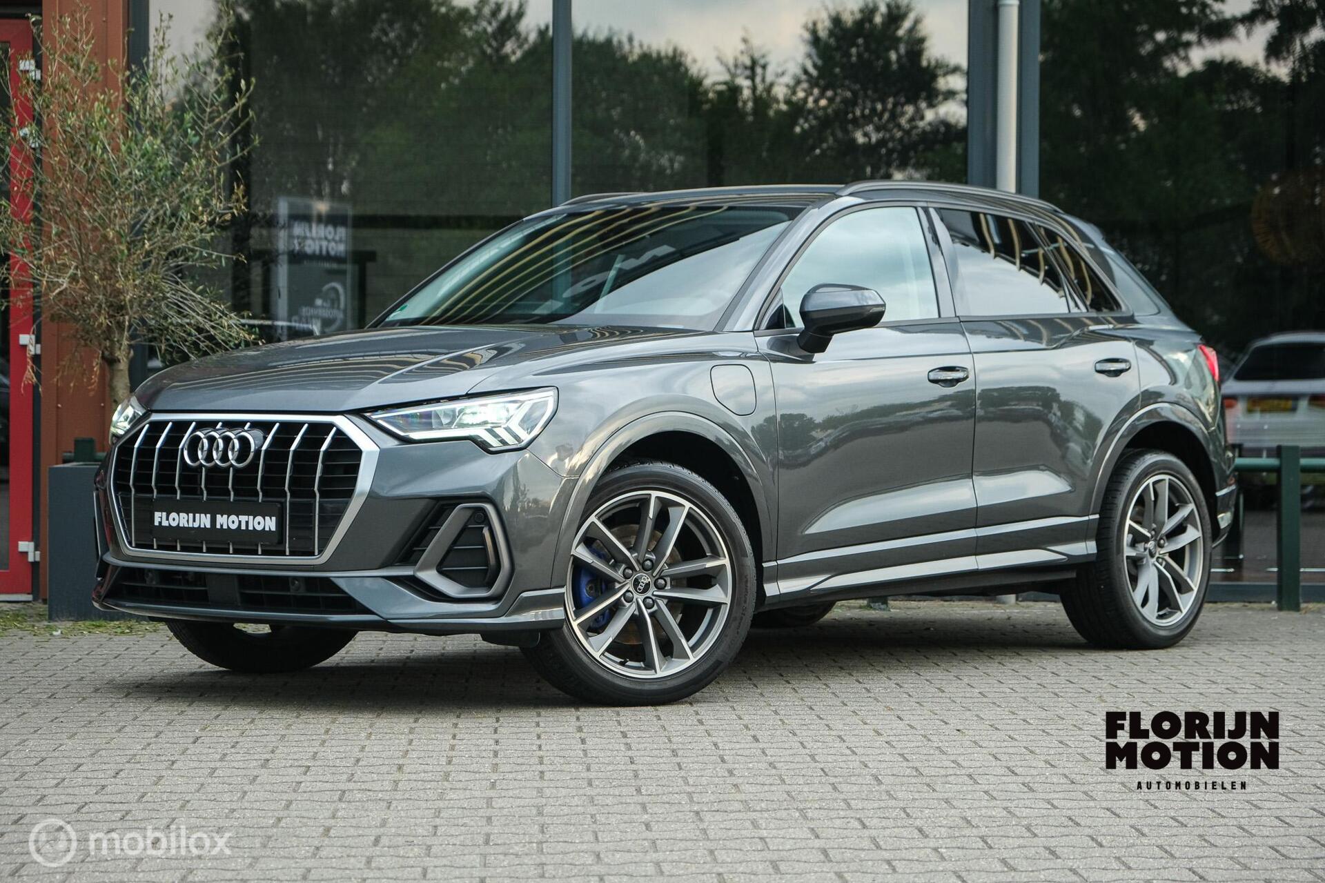Audi Q3 E-tron 45 TFSI e S edition | ACC | Sportstoelen | Trekhaak | Stoelverwarming | LED | 19 Inch | Camera | Longlife onderhoud | Zeer netjes | Alcantara inleg | Daytona grey 2021 - voorkant