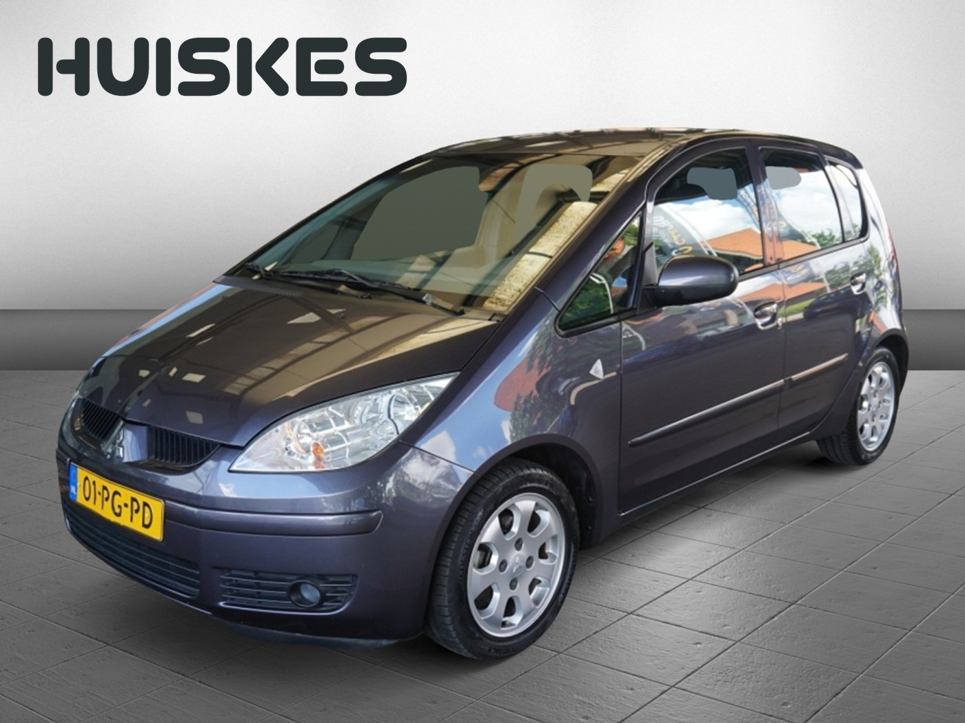 Mitsubishi Mitsubishi Colt 1.3 Inform Cool Pack Plus Automaat | Afn. Trekhaak | Airco 2004 - voorkant