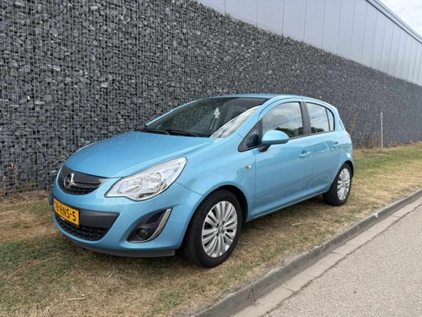 Opel Corsa 1.2-16V Edition AIRCO | 5 Drs 62066km! 2011 - voorkant