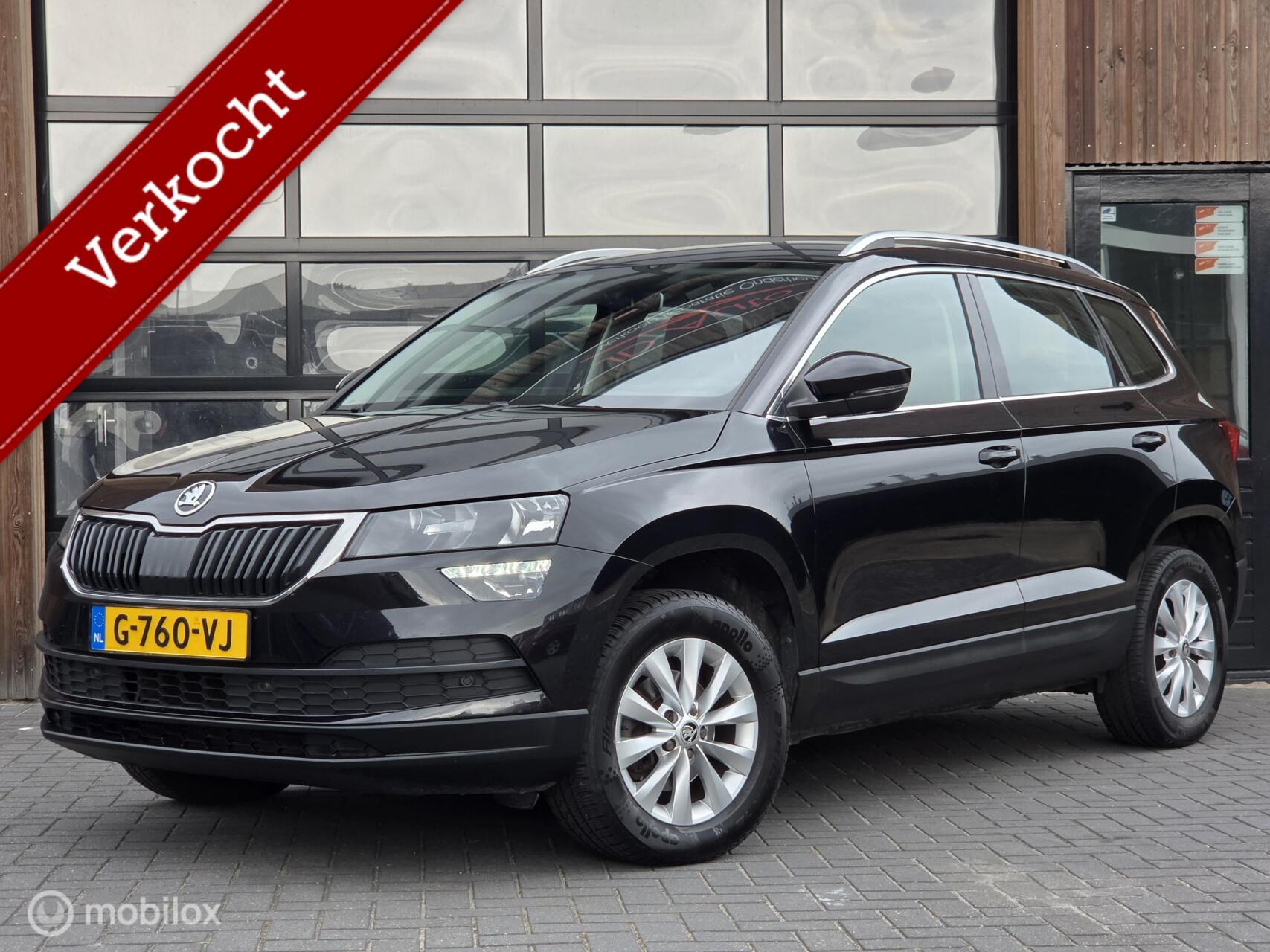 Skoda Karoq 1.6 TDI DSG CRUISE CARPLAY NAVI TREKHAAK STOELVERWARMING 2019 - voorkant