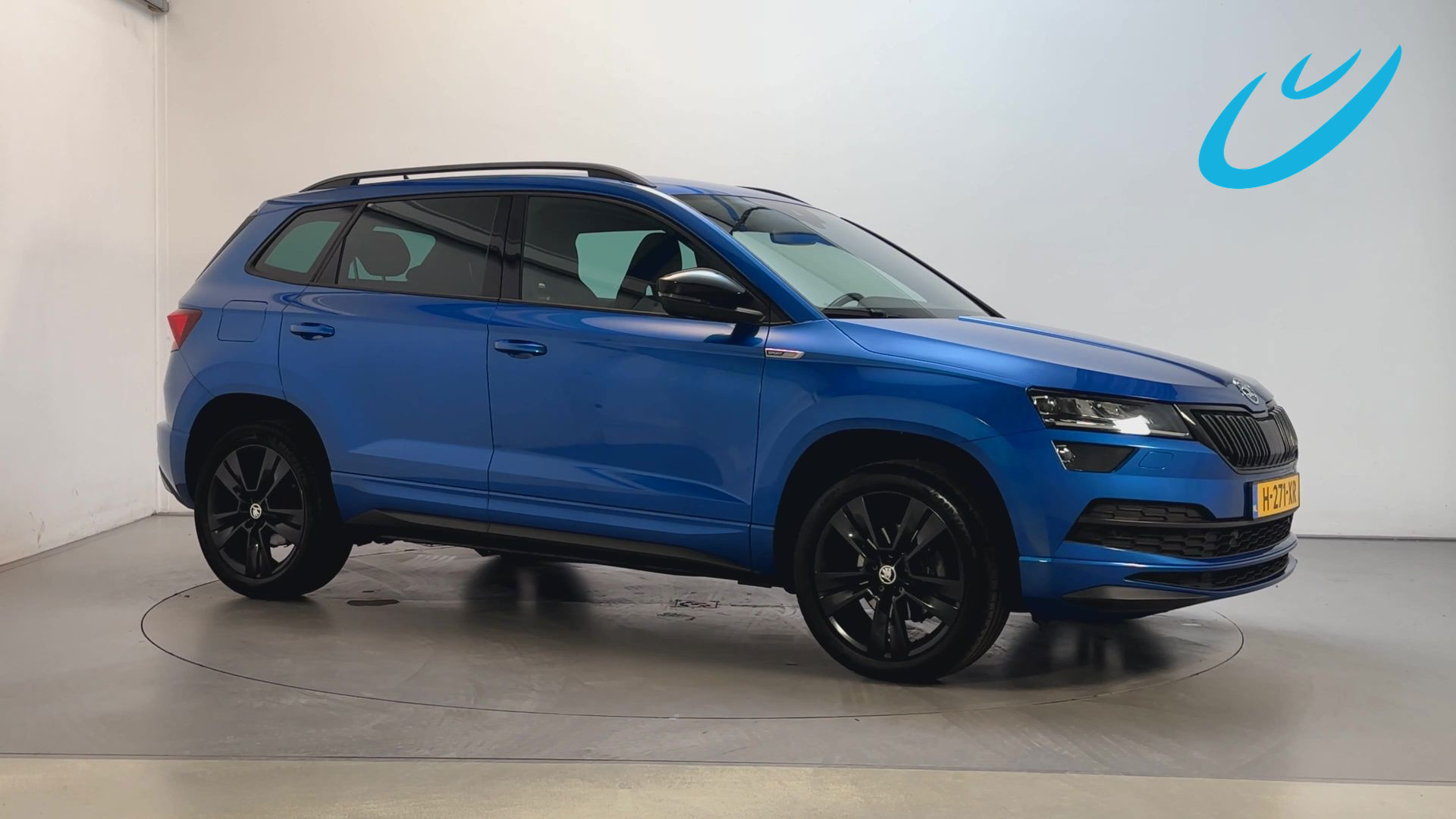 Skoda Karoq 1.5 TSI 150pk ACT Sportline Business Camera Trekhaak Sfeerverlichting Stoelverwarming Adaptive Cruise LED 2020 - voorkant
