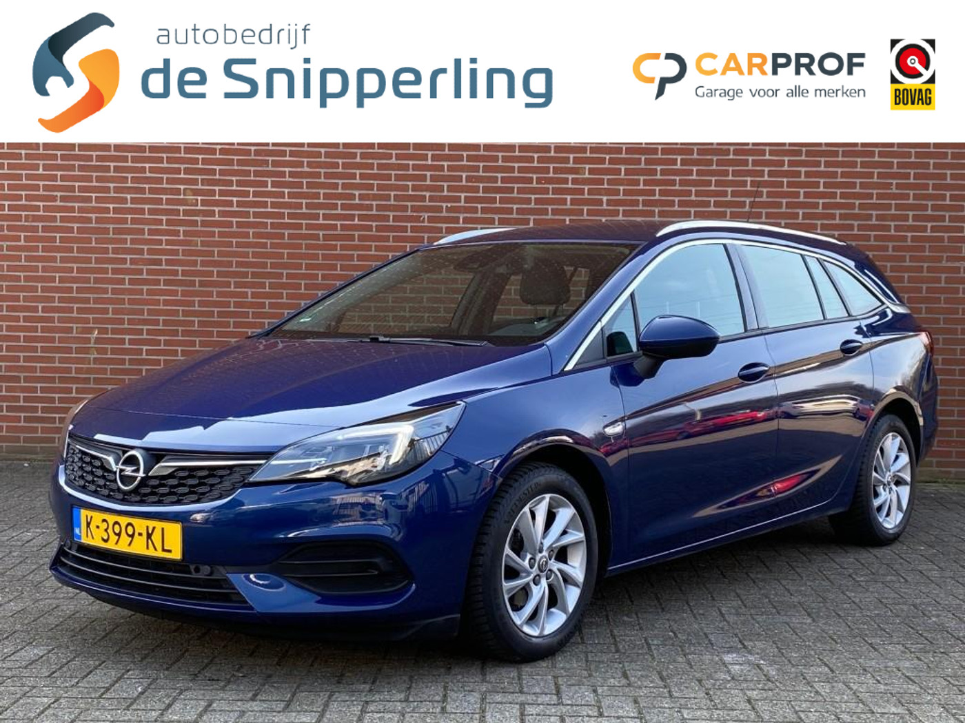 Opel Astra Sports Tourer+ 1.2 BUSINESS ELEGANCE NAV CRUISE CARPLAY TREKHAAK CAMERA LMV 2021 - voorkant
