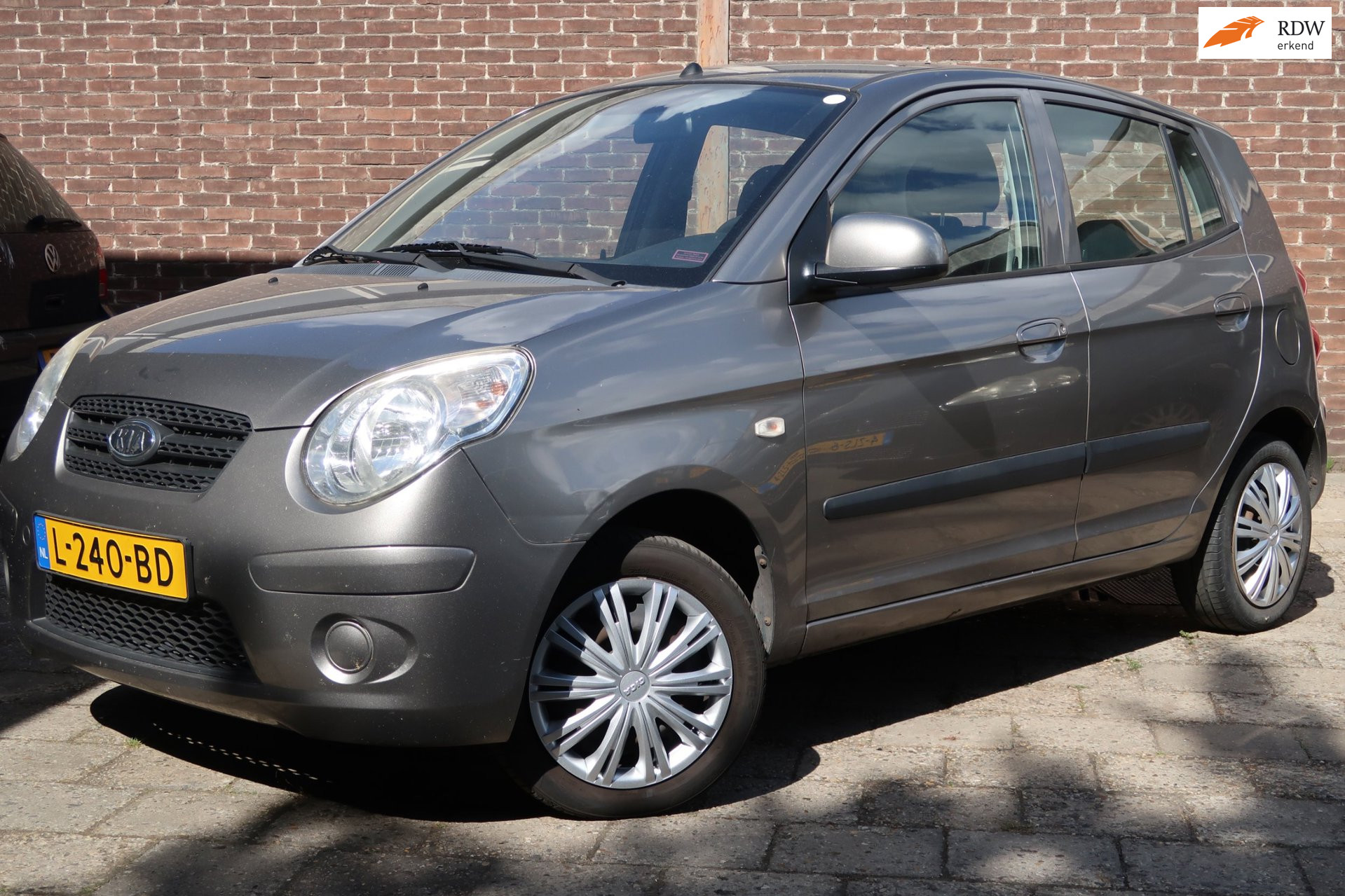 Kia Picanto 1.1 Fifteen * Rijklaarprijs *APK *onderhouden 2010 - voorkant