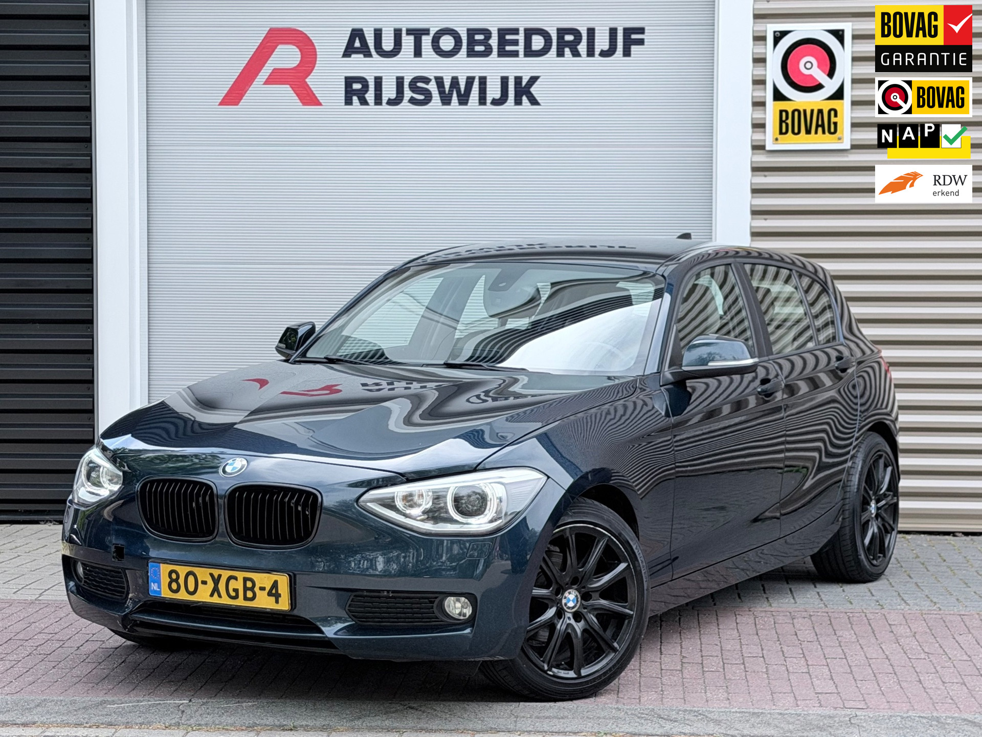 BMW 1er Reihe 116i Business+ Navi/Xenon/Leer 2012 - voorkant