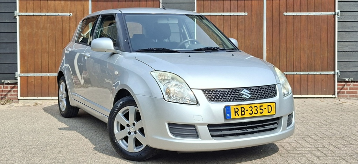 Suzuki Swift 1.3 Airco | Bluetooth | Muziek Streamen | Nieuwe Koppeling | All seasonbanden 2010 - voorkant