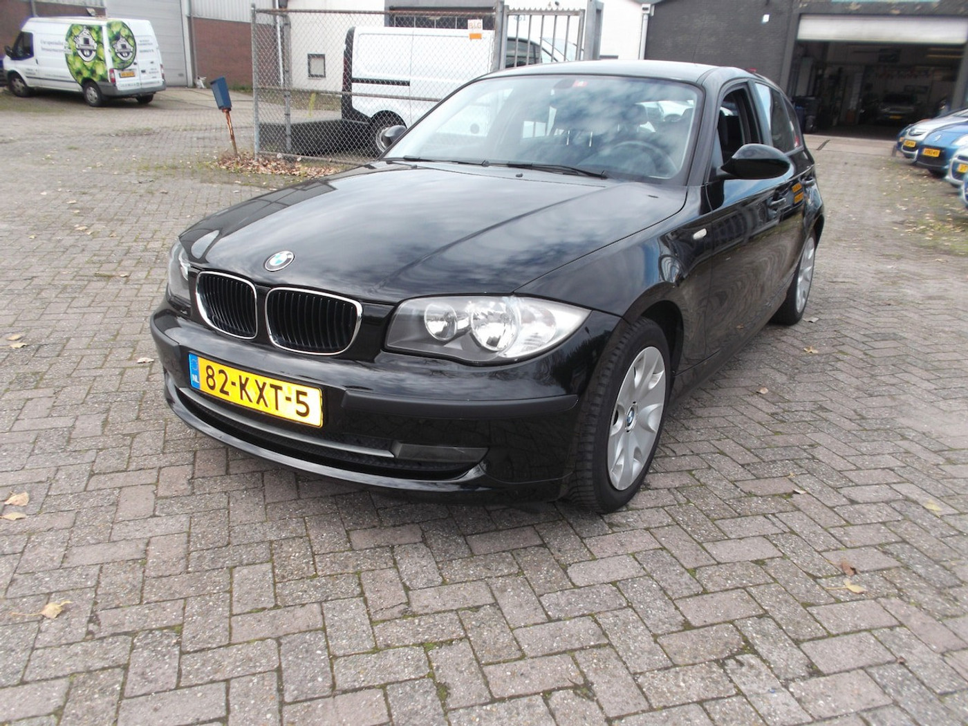 BMW 1er Reihe 116i Corporate 2010 - voorkant
