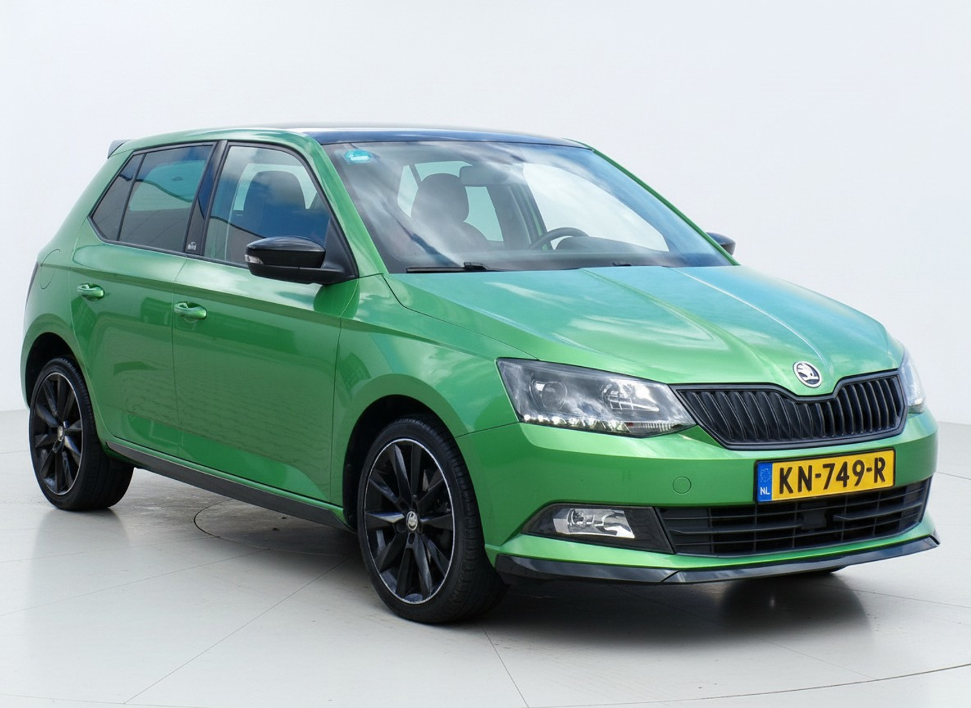 Skoda Fabia 1.2 TSI Monte Carlo|LED|Navi|Cruise|Glazendak|BT 2016 - voorkant