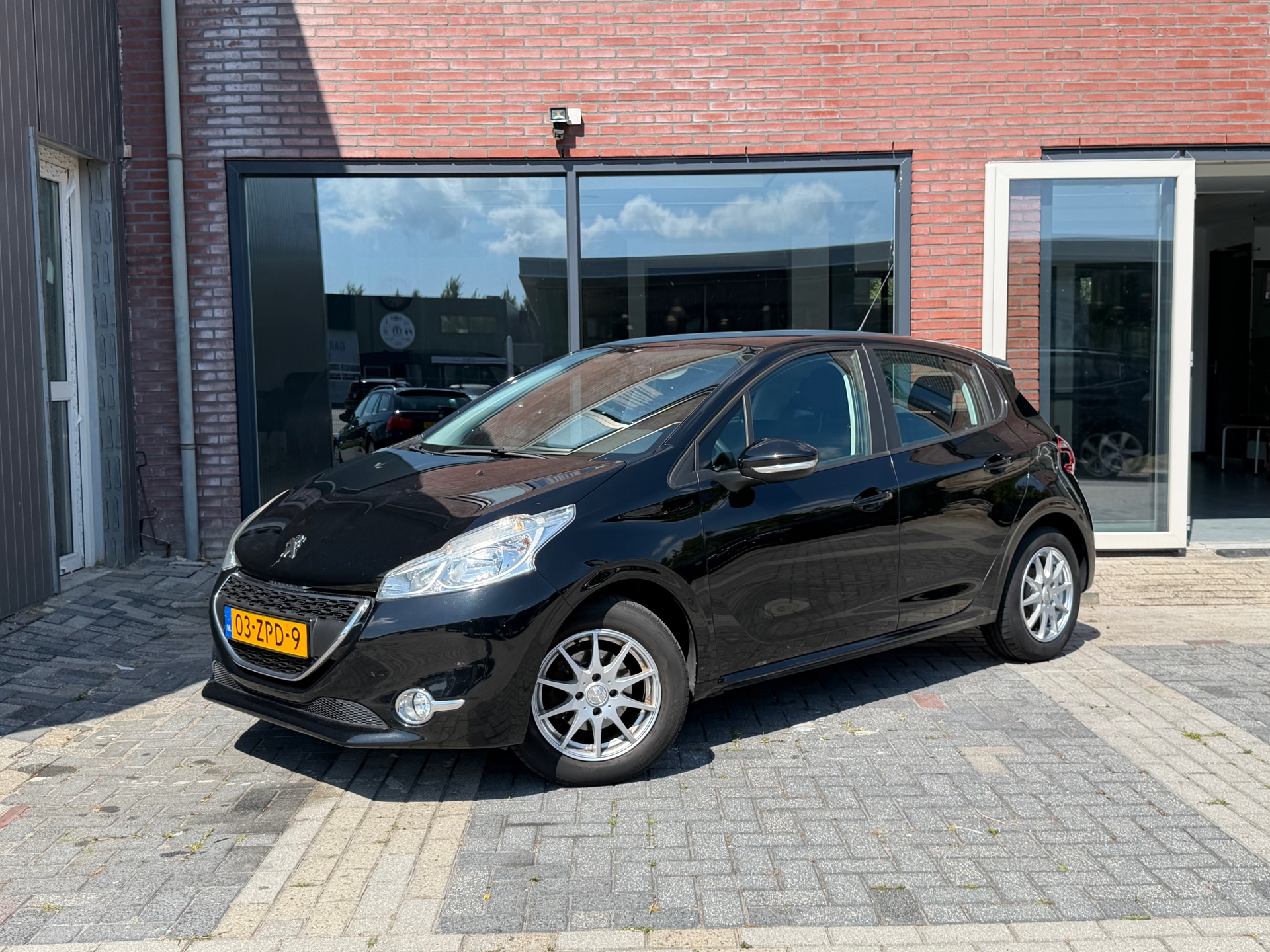 Peugeot 208 1.2 VTi Access | DB V.V. | 06-2027 APK! | Cruise | Airco | Navi | PDC | 2013 - voorkant