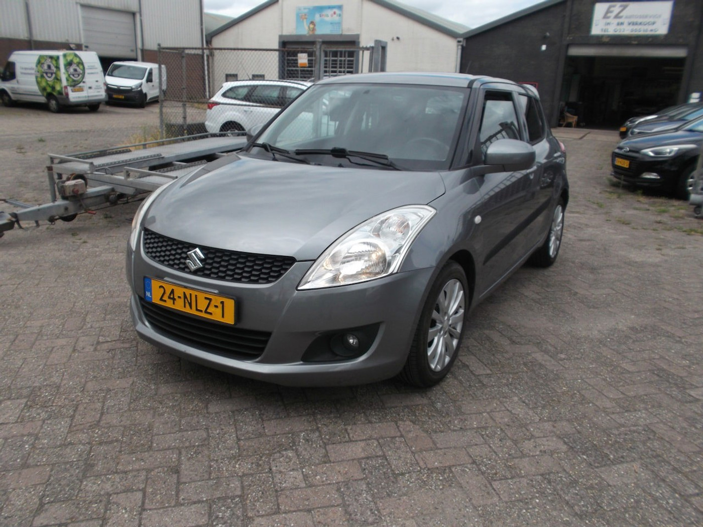 Suzuki Swift 1.2 Exclusive EASSS 2010 - voorkant