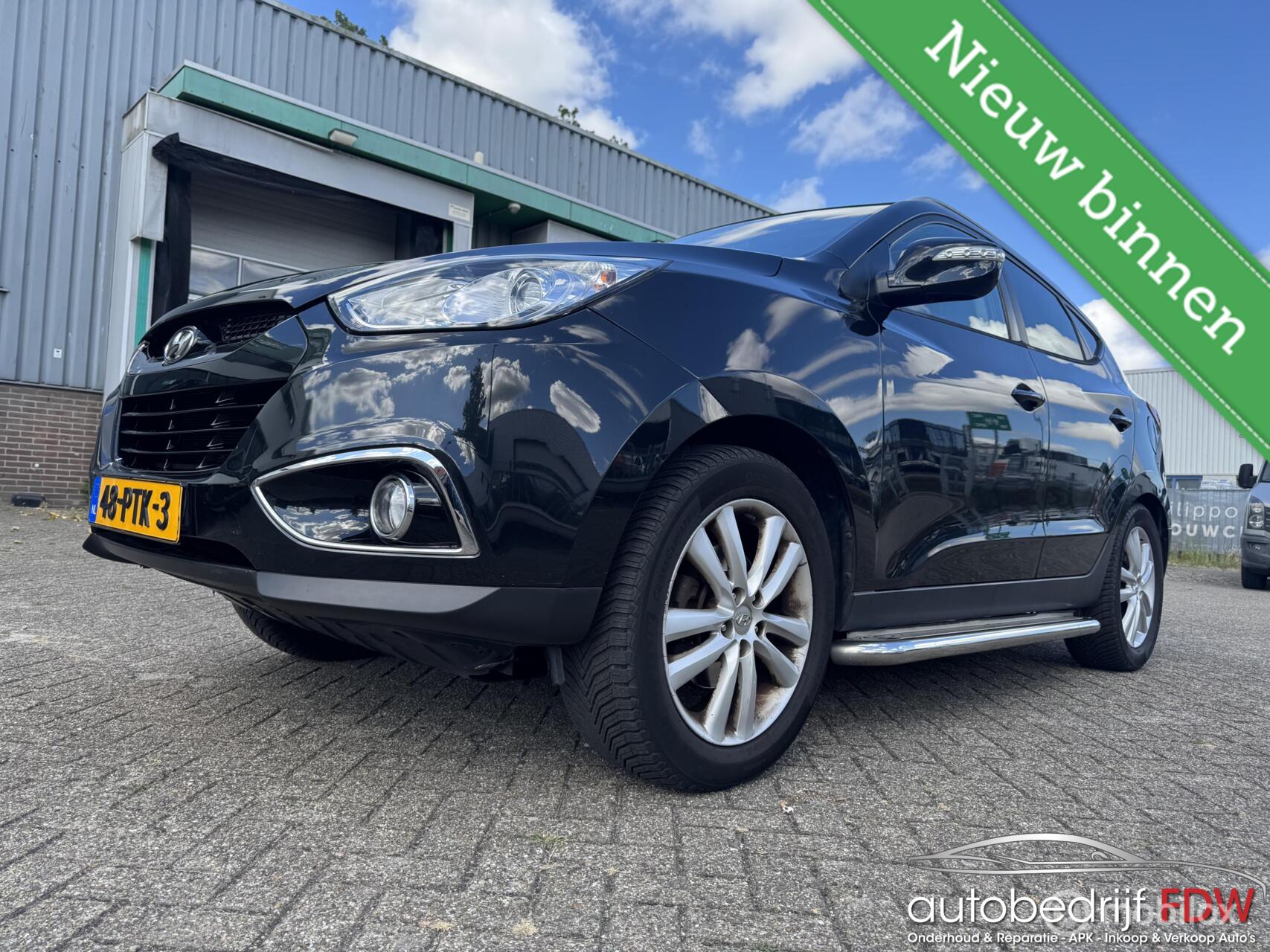 Hyundai Ix35 2.0i/AIRCO/STOEL VERWARM/TREKHAAK/NAP/PANO DAK 2011 - voorkant